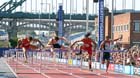 Jason Richardson (USA) wins the 110 metres hurdles from Ray Wilson (USA), Lawrence Clarke and Alex Al Ameen at the 2012 BUPA Great North CityGames.
